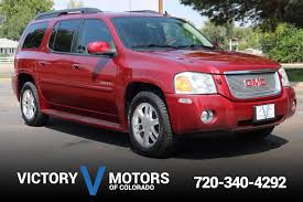Image result for Cherry Red 2001 Envoy