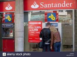 Barcelona Spain People At The Atm Of The Branch Of Banco Santander Stock Photo Alamy