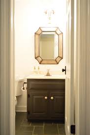 The cabinet design looks impressive but we're not talking about that right now. Painting Our Bathroom Vanity Twice To Get It Right Young House Love