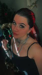 Explore the Alluring Vampiress Emma's Flirtatious Side