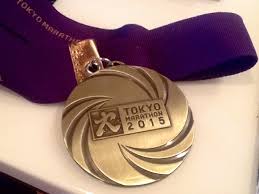 Sapporo, japan — as a challenged olympics waned to its closing fumes on a sunday morning beneath merciful clouds, maybe the most beautiful of all the world's runners ran out alone so far ahead. Tokyo Marathon Medal Marathon Medal Tokyo Marathon Medals