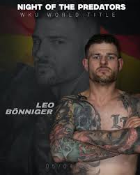 Der Weltmeister kehrt zurück 👑 🔥WKU Weltmeisterschaft Leo Bönniger🔥 Am  5. April 2025 kehrt @leo_boenniger aus dem renommierten @galaxyfightclub in  Regensburg zurück an den Ort seines bisher größten Triumphs: die Helmut-Ott-Halle  in