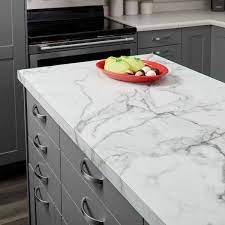 The grey and taupe vein structure are large scale and angular and aeon laminate worktop in calcutta marble. Pin By Dawn Rutherford On Kitchen Cabinet Design In 2021 Kitchen Countertops Laminate Formica Kitchen Countertops Laminate Kitchen