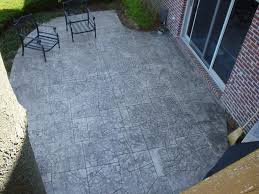 A wonderfully designed ashlar slate stamped concrete that gives this patio a timeless appearance. Stamped Concrete Colors And Patterns