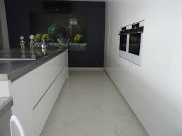 Porte de cuisine laque blanc. Cuisine Design Grand Ilot Central Laque Blanc Brillant Et Plan Inox Et Marbre Moderne Cuisine Marseille Par Cuisine Connexion Houzz