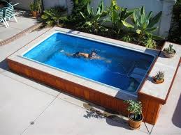 25 Stunningly Awesome Swim Spa Installation Ideas For Your Backyard These Days The Popularity Small Backyard Pools Endless Pool Small Backyard Landscaping