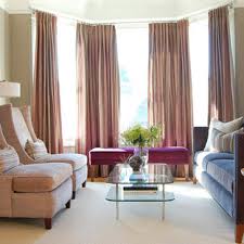 A block out is set as the inner layer, while that grey and white, or known as creamy white, curtains becomes the outer layer. Living Room Curtains Ideas Photos Houzz