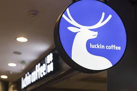 + executive officer of luckin coffee, bang a gong as stocks start trading during the company's initial public offering (ipo) at the nasdaq marketsite in new york on may 17. Luckin Coffee Delays Its Annual Report Citing Pandemic Bloomberg
