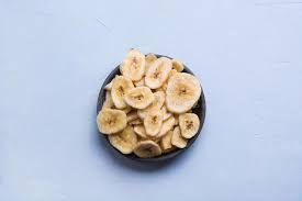 Maybe you would like to learn more about one of these? Dehydrated Dried Banana Chips On Light Background View From Above Stock Photo Image Of Natural Delicious 164954542