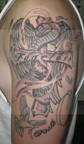 The cross with the snake on it has many meanings, ranging from the staff of aesculapius or hermes' caduceus, which represent healing, and messengers respectively, to the asherah pole the biblical. Snake And Cross Bozeman S Tattoo Alley L L C Pictures Tattoo Alley