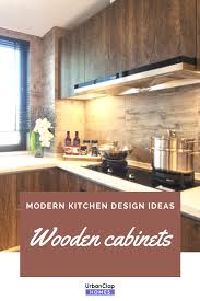 Modern Kitchen Design Idea With Wooden Cabinets Corian Countertop An Integrated Cooktop Or Smooth Top Cooktop Modern Kitchen Modern Kitchen Design Kitchen