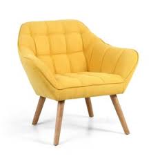 The angled arms of this chair resemble the legs of a grasshopper forming a deep bent curve. Black Studded Modern Armchair Freitaslaf Net Ltd Freitaslaf Net Ltd