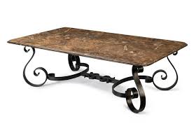 The base has an interlocking design of three wide haripin legs, and is finished in your choice of gold or black for a look that contrasts with the marble's tone. A Coffee Table Wrought Iron With Stone Slab Top With Tables Zother Furniture