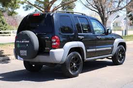 Image result for Brilliant Black 2005 Jeep