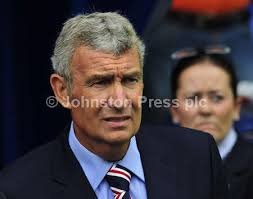 25300832-Rangers v Brechin City. Rangers legend Sandy Jardine unfurls the  Championship flag. Final Score 4-1 to Rangers. Picture Robert Perry  Scotland