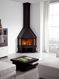 After a day on the ski hill or an afternoon of shovelling, there's nothing quite like warming up by a wood burning fireplace. Image Result For Lounges With Corner Round Wood Burners Fireplace Design Corner Gas Fireplace Woodburning Stove Fireplace