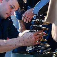 Electrician's Mate 2nd Class Sherrod Glover conducts