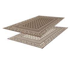 Rv rv patio mats are super easy to clean and most of them roll up so that they'll easily fit in one of your rv's underneath storage compartments. Faulkner 48700 Reversible Rv Outdoor Patio Mat Beige Vineyard Design 9 X 12