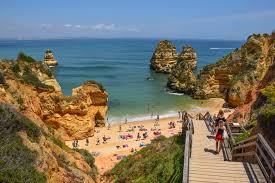 Praia do barril is located on the island of tavira and is undoubtedly one of the most relaxing beaches in the algarve, with its silvery white sand and transparent blue sea. The Best Of The Algarve Portugal In 3 Sun Splashed Days