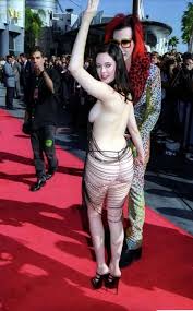 15 Most Iconic Red Carpet Dresses Of All Time Red Carpet Dresses Rose Mcgowan Dress Picture