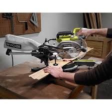 Press down gently on the top of the saw arm so the pivot joint floats freely between the upper and lower limits of its . Ryobi 15 Amp 10 In Sliding Miter Saw With Laser