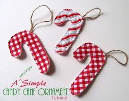 Top your creations with reflect the sweetness of the season with ornaments made from simple peppermint candies. Easy Sew Candy Cane Ornament Holiday Candy Cane Ornaments