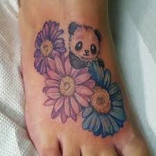 In the perennial battle between tigers and bears, sometimes tigers win and sometimes bears win. Panda Bear And Daisy Flowers Tattoos On Right Foot