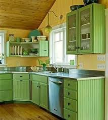 Small Kitchen Designs In Yellow And Green Colors Accentuated With Red Or Light Blue Kitchen Design Small Green Kitchen Cabinets Yellow Kitchen Designs