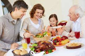 My mother in law wanted a huge family photo. Portrait Of Happy Family Having Thanksgiving Dinner Stock Photo Picture And Royalty Free Image Image 31700876