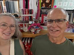 I had Kathy from Sassy Sacks make me a shoulder bag, with three pockets