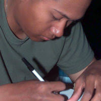 US Marine Corps (USMC) Private First Class (PFC) Colby Archer, 3rd Light  Armored Reconnaissance Battalion, Twentynine Palms, California (CA), plays  a game of casino with his time off at Camp Ripper, Kuwait,