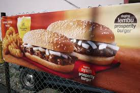 Advertisement On A Chain Linked Fence For Mcdonald S Prosperity Burger In Penang Malaysia Mcdonald S Offers Prosperous Chinese New Year Mcdonalds Burger Food
