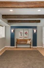 If the rafter ceiling in your unfinished basement feels too cold and industrial for your taste, soften it by hanging swaths of fabric to create a beautiful canopy ceiling. 39 Basement Ceiling Design Ideas Sebring Design Build