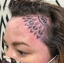 Image result for forehead tattoo