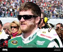 Dale Earnhardt Jr stands by his car just prior to the start of the Daytona  500