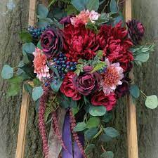 The most common jewel tone flowers material is metal. Boho Jewel Tone Bouquet With Burgundy Eggplant And Fuchsia Roses Dark Fuchsia Dahlia Eucalyptus Blue Berries Raspberry And Ferns Jewel Tone Wedding Flowers Fall Wedding Flowers Jewel Tone Bridesmaid