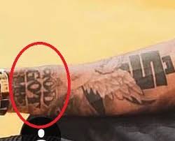 Black colour ink with little shades of red would give it an electrifying look. Nipsey Hussle S 31 Tattoos Their Meaning Body Art Guru