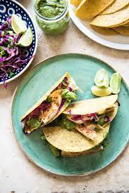 In a small bowl, mix together paprika, salt, pepper, garlic powder, red pepper flakes, oregano, and thyme. Fish Tacos With Lime Slaw And Uh Mazing Green Sauce Gather A Table
