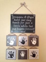 Personalize the print with photos that capture precious moments shared between grandma and her grandkids. Pin By Sara Mcgavin On Handprint Ideas Diy Mothers Day Gifts Diy Christmas Gifts Mother S Day Diy