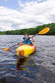 Boy Kayaking 9 Year Old Boy Enjoying Kayaking Affiliate Kayaking Boy Year Enjoying Boy Ad Kayaking Photo Stock Photos