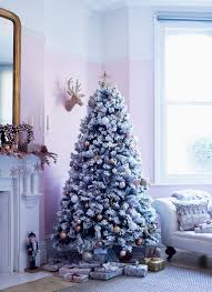 Holiday design expert brad schmidt decorated this wintry, whimsical christmas tree in soft blush, gold and ivory ornaments from balsam hill. How To Decorate Your Home On A Budget For Christmas Asda Good Living