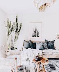 Due to its playful nature, bohemian interior design fuses styles together with a casual tone. Pin By Lauren Winters On Interior Modern Bohemian Living Room Bohemian Chic Living Room Boho Chic Living Room