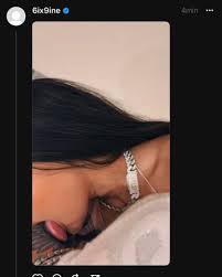 Tekashi difunde foto de Yailin lamiéndole el cuello en su Threads
