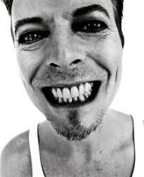 a devil in your bleeding face.