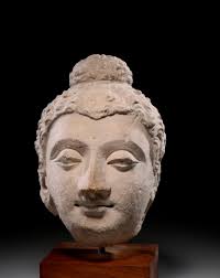 Bonhams : A carved jade belt buckle and a collection of jadeite buttons  Late Qing dynasty