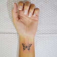 P I N T E R E S T Themarisaolvera Butterfly Wrist Tattoo Leg Tattoos Trendy Tattoos