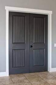 The question is the single sidelight, match the trim or the door? Behr Classic Silver Dark Granite And Silky White Interior Door Colors Painted Interior Doors Doors Interior