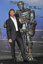 Is There Anything Hugh Jackman Won T Do For His New Film Actor Punches Wrestler As He Crashes Wwe Match To Promote Robot Boxing Movie Red Steel Hugh Jackman Jackman Celebrity Dads