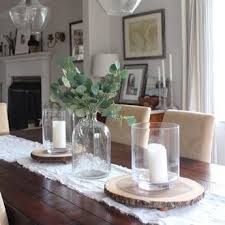 Decorating the dining table with candle holder and diffe. Taylor Extra Large Hurricane Candle Holder Reviews Crate And Barrel Dinning Room Table Decor Dining Room Table Centerpieces Table Centerpieces For Home