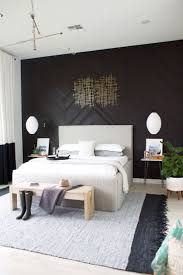 Update the look in your bedroom by adding an accent wall. Master Bedroom Reveal Diy Herringbone Wall With Stikwood Kristi Murphy Diy Blog Feature Wall Bedroom Master Bedrooms Decor Small Master Bedroom